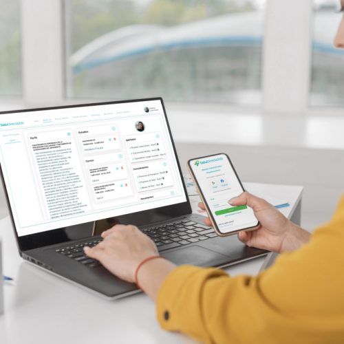 Close up woman with laptop and phone